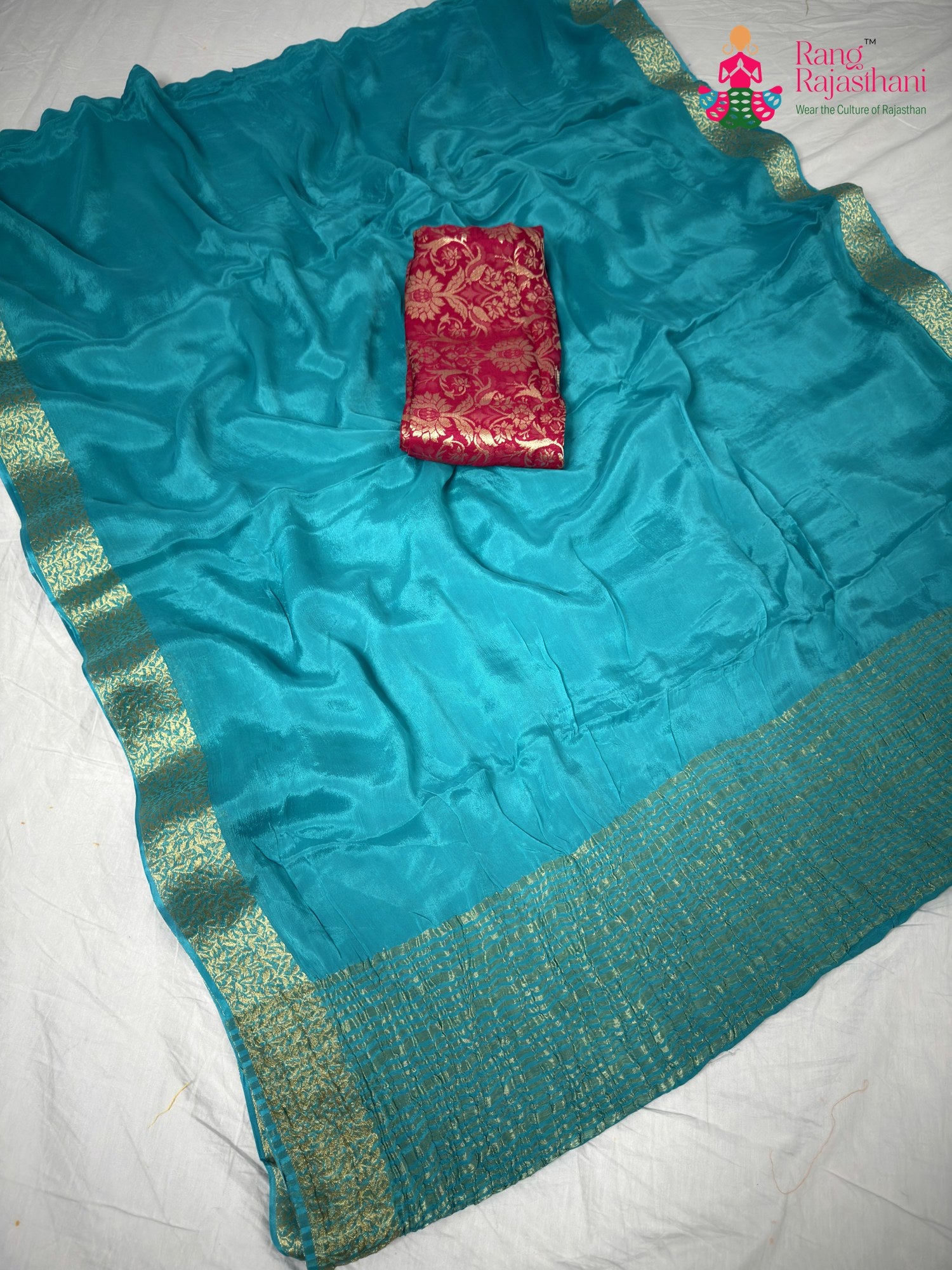 border detailing of artisanal firozi fabric saree