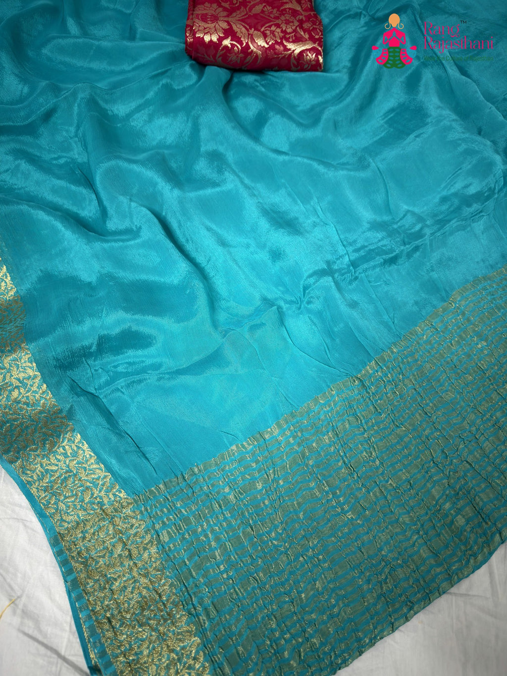 fabric texture of artisanal firozi fabric saree