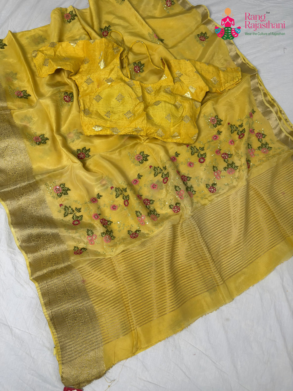 border detailing of artisanal yellow fabric saree