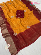 border detailing of artisanal yellow silk saree