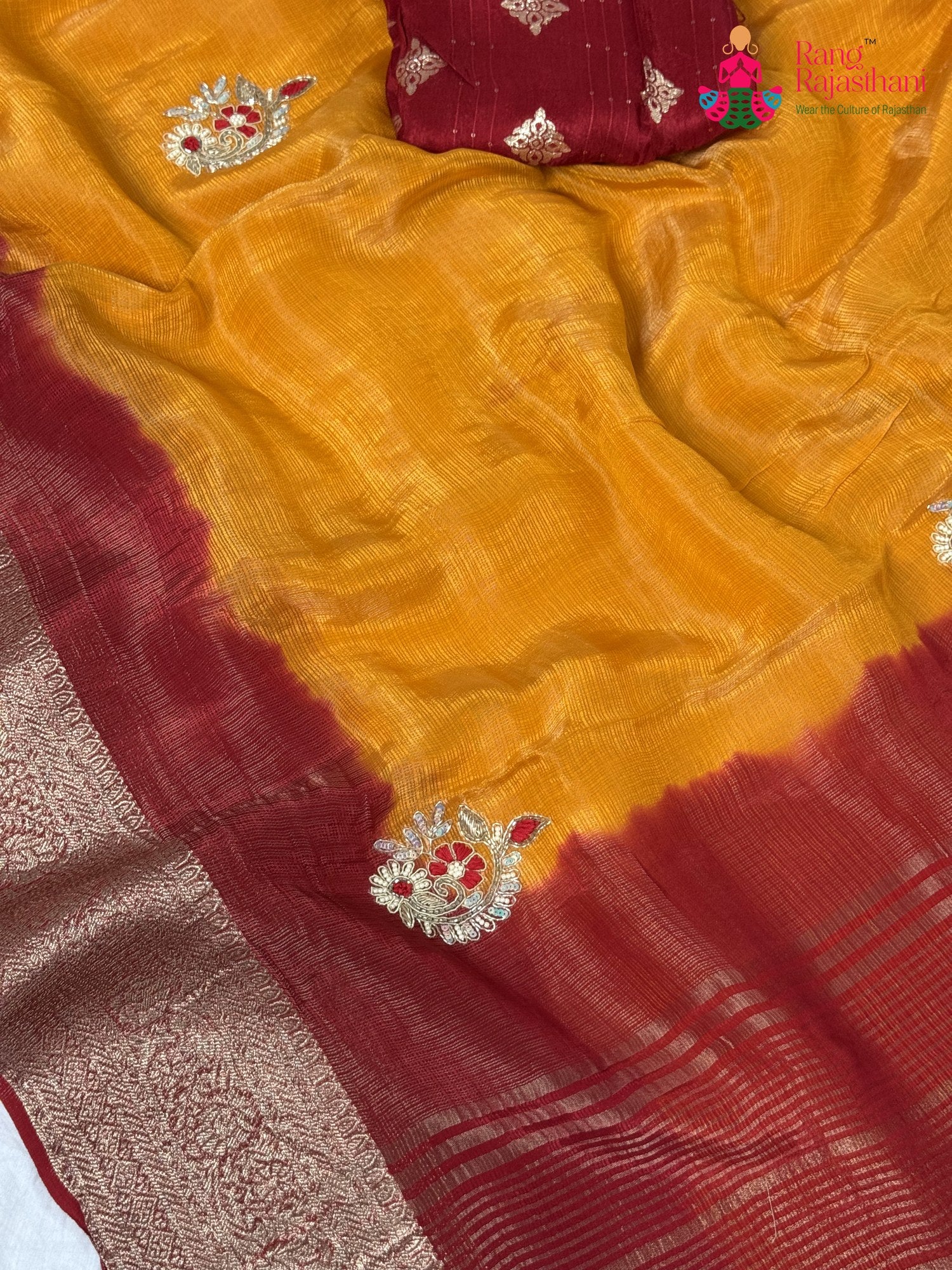 fabric texture of artisanal yellow silk saree