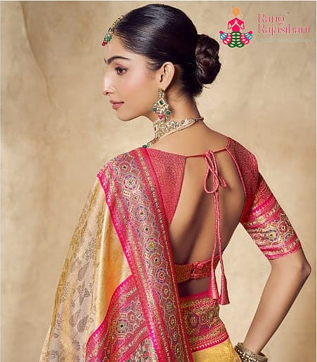 pallu detailing of beige art silk banarasi zari weave saree 