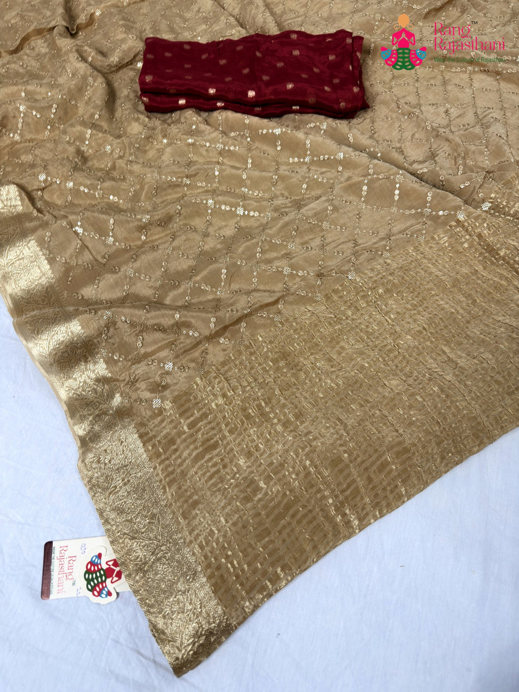 pallu detailing of beige chinnon sequin saree