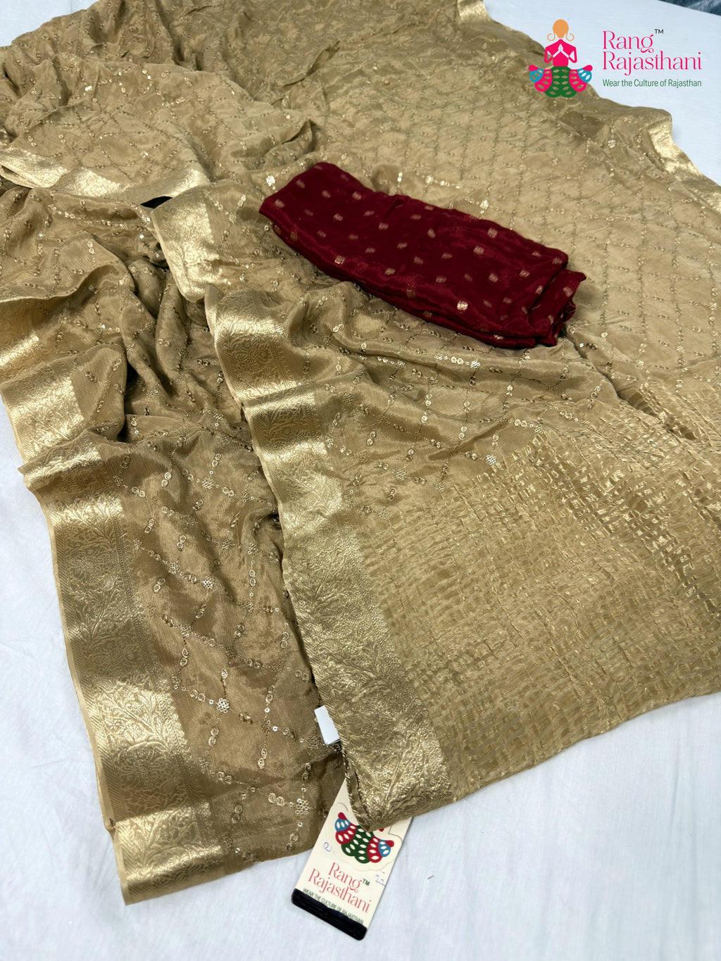 close up detailing of beige chinnon sequin saree