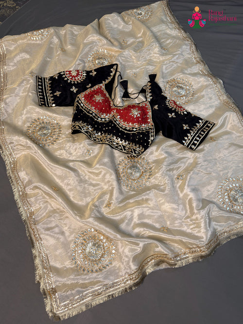 border detailing of beige pure tissue silk gota patti saree