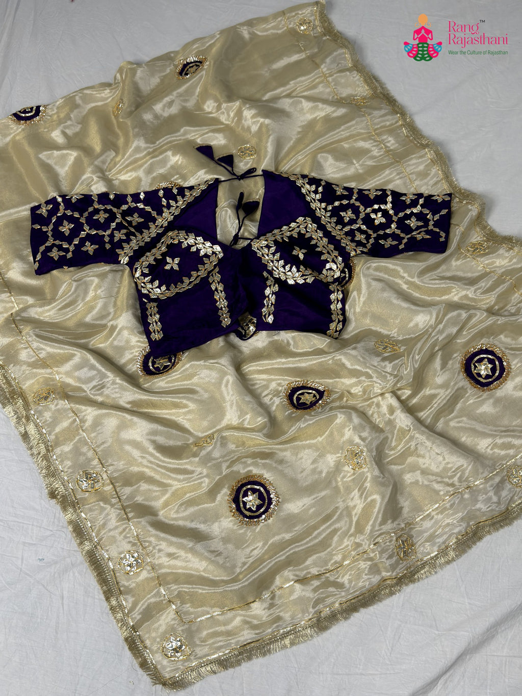pallu detailing of beige pure tissue silk gota patti saree