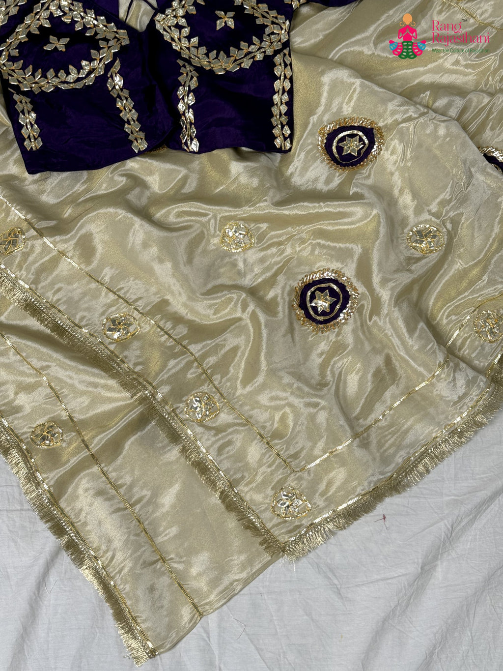 border detailing of beige pure tissue silk gota patti saree