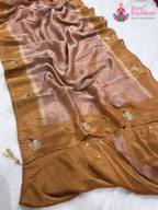 close up detailing of beige pure tissue silk hand saree 