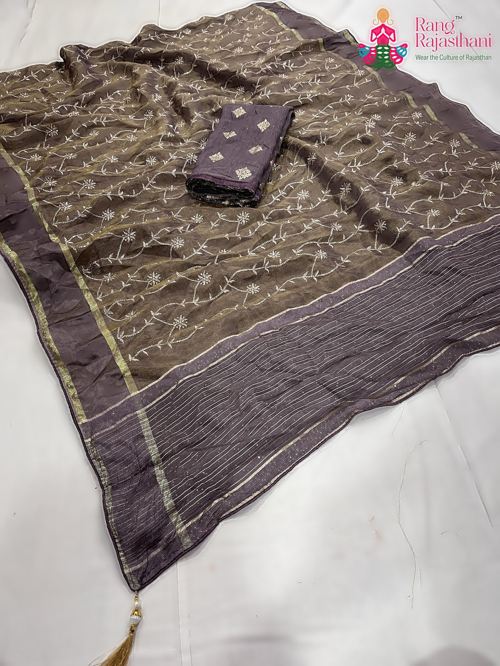 complete look of beige pure tissue silk zari embroidery saree 