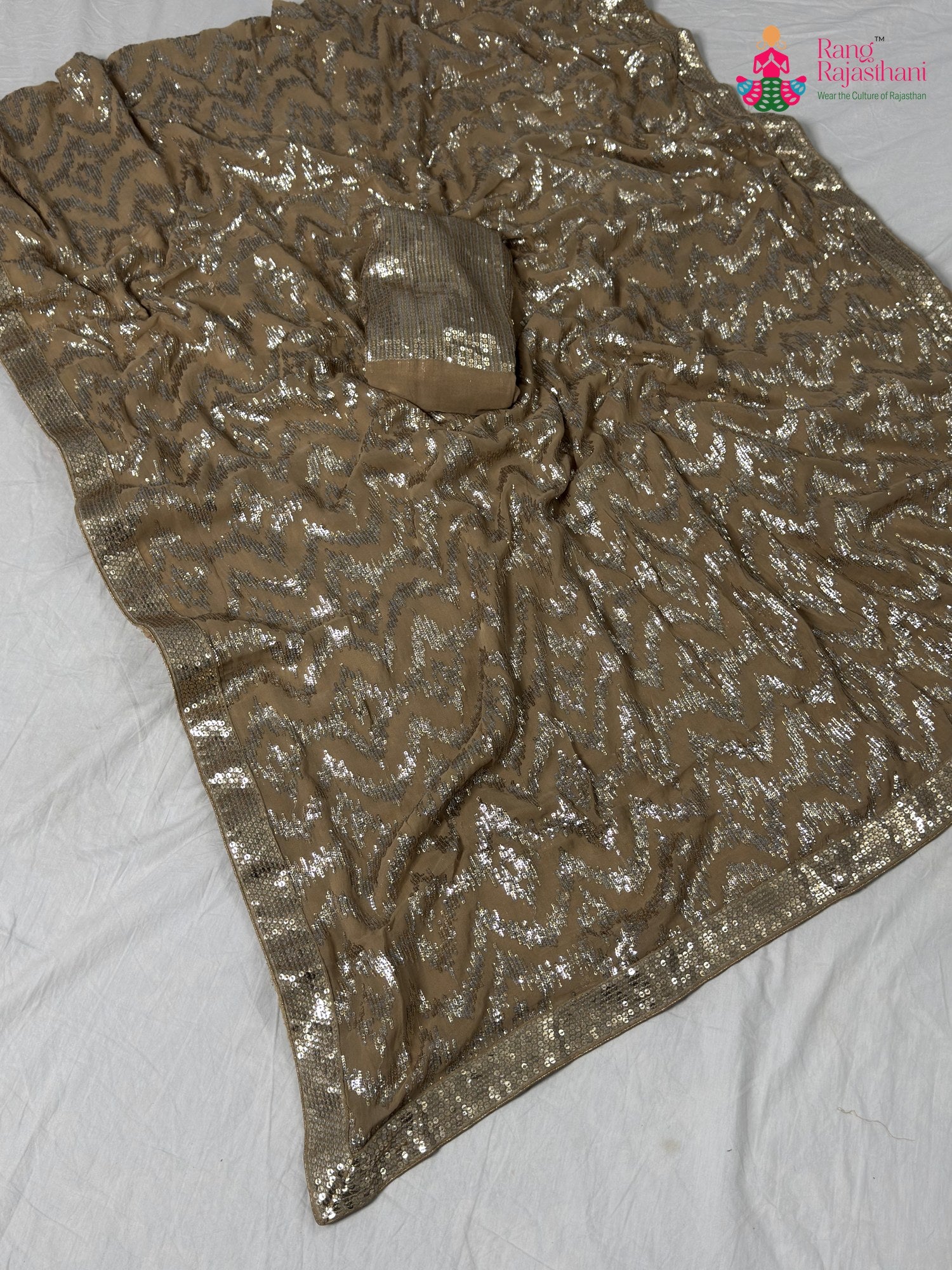 beige synthetic hand embellishment saree by Rang Rajasthani