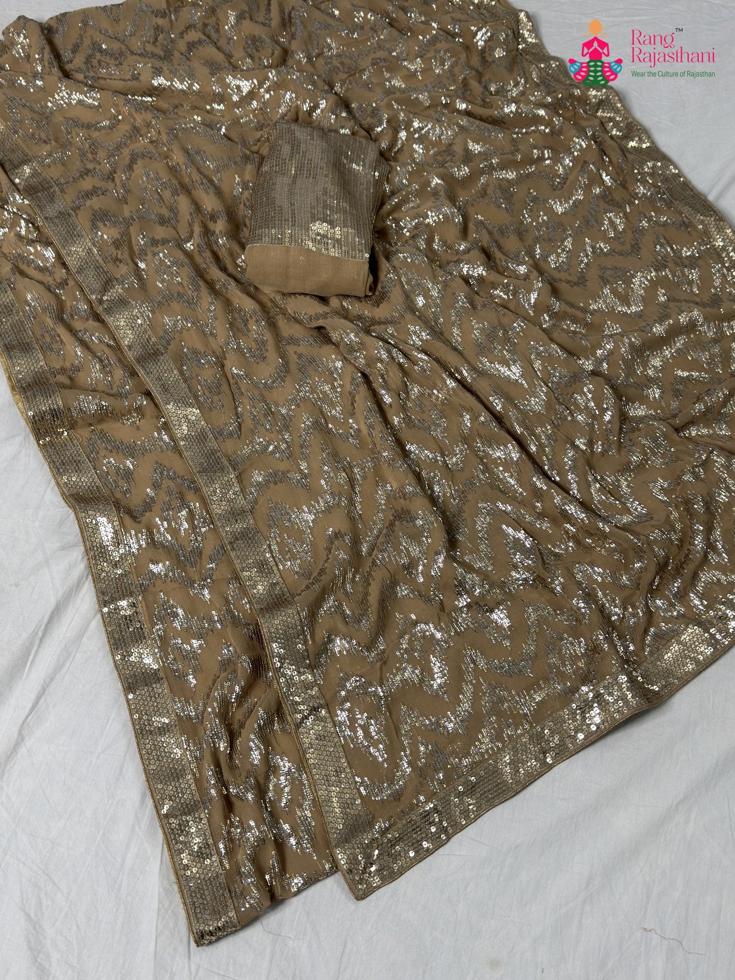 complete look of beige synthetic hand embellishment saree