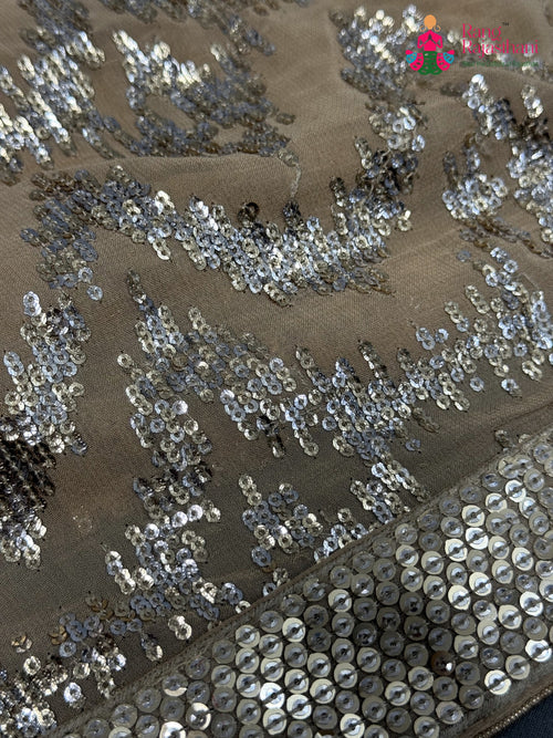 design pattern of beige synthetic hand embellishment saree