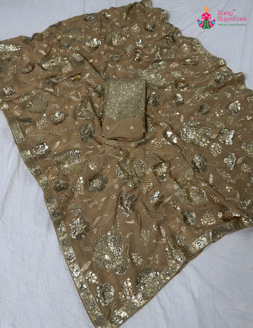 pallu detailing of beige synthetic sequin saree