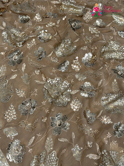 border detail of beige synthetic sequin saree