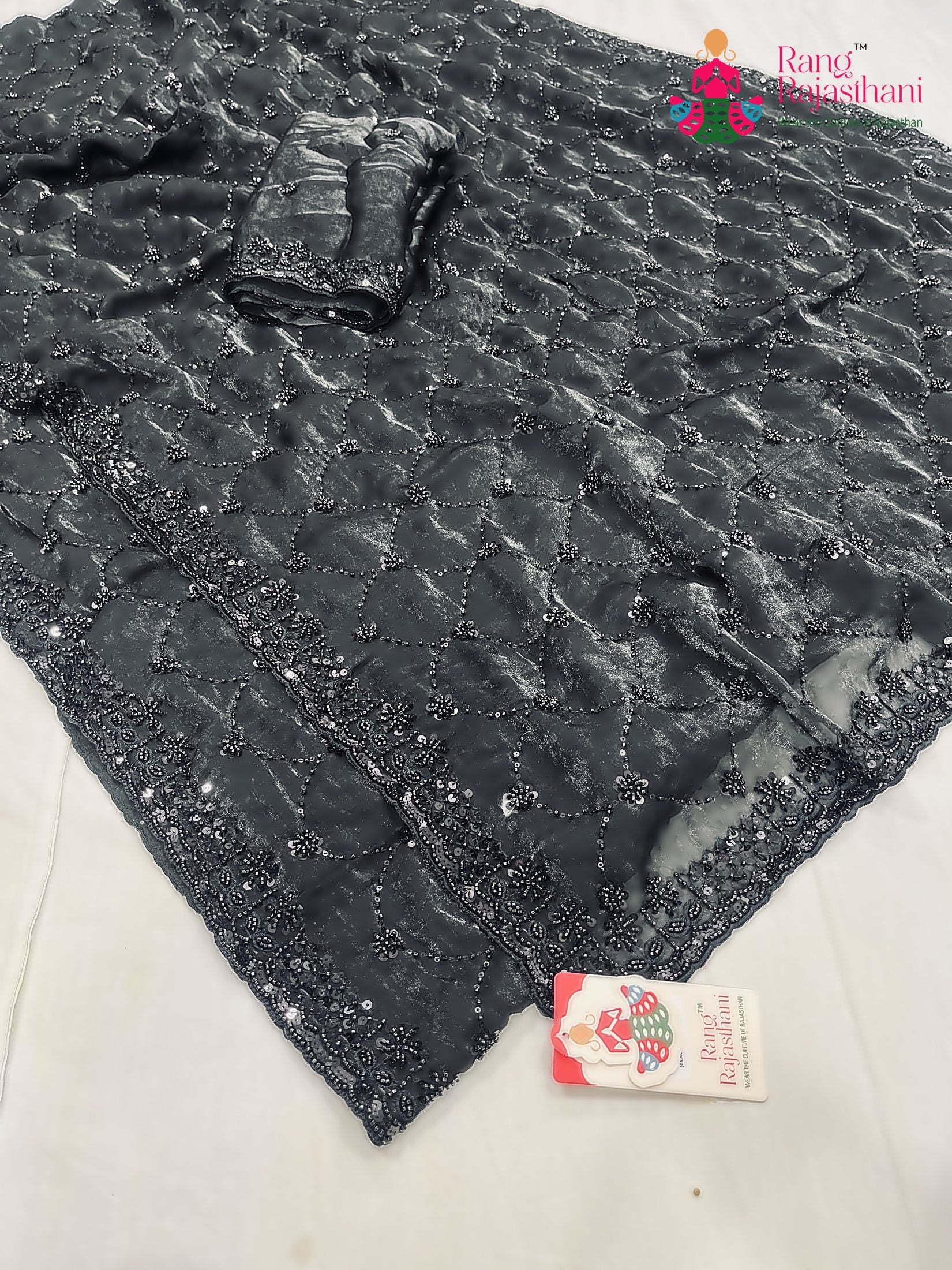 pallu detailing of black art silk sequin saree 