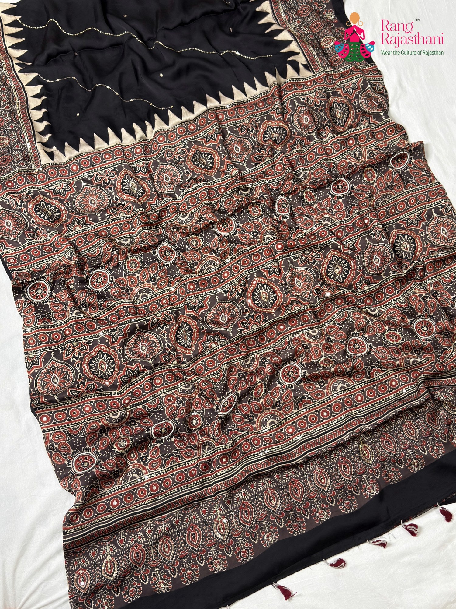 full view of black modal ajrakh print saree