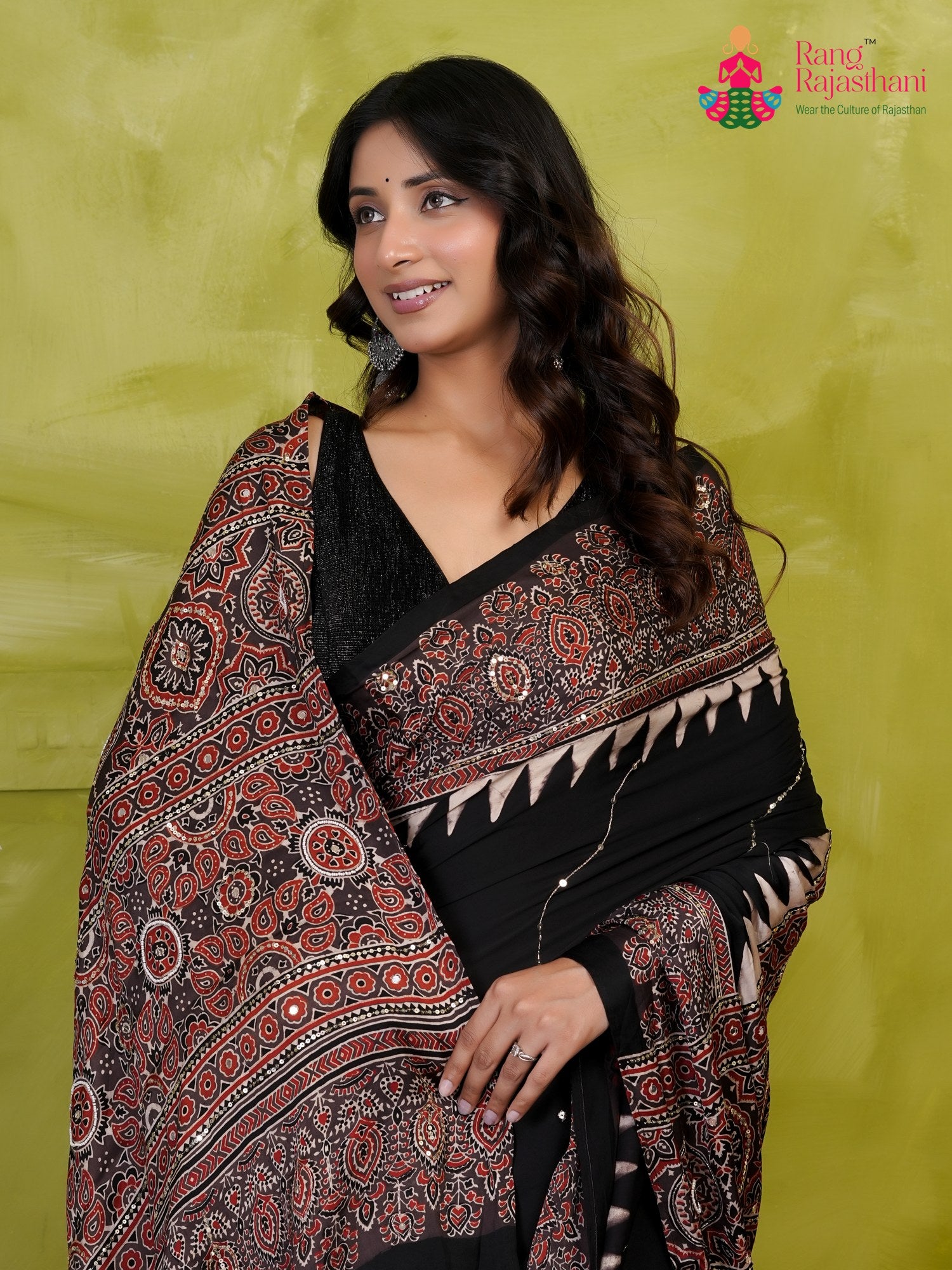design pattern of black modal ajrakh print saree