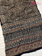 color and weave of black modal ajrakh print saree