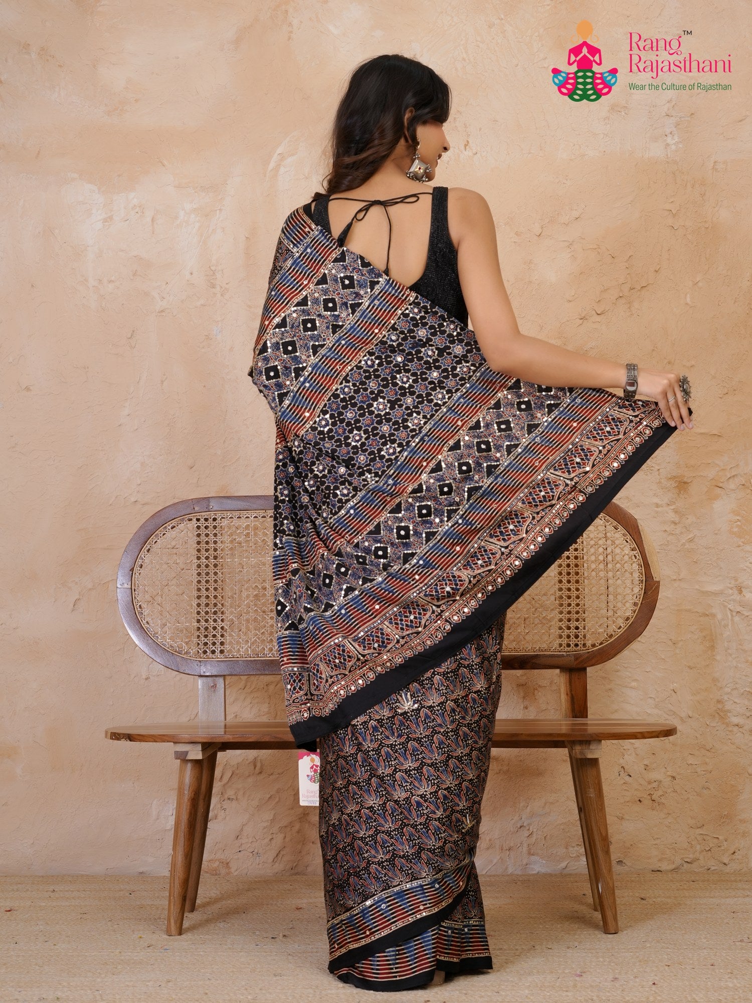 border detail of black modal ajrakh print saree