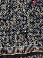 full view of black modal ajrakh print saree