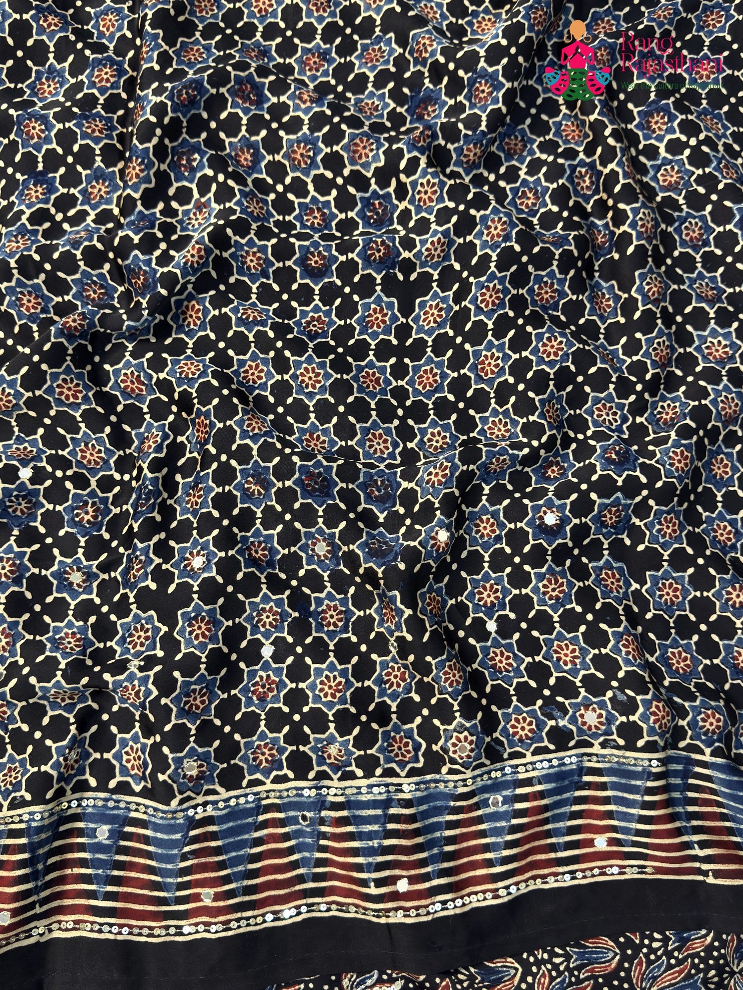 full view of black modal ajrakh print saree