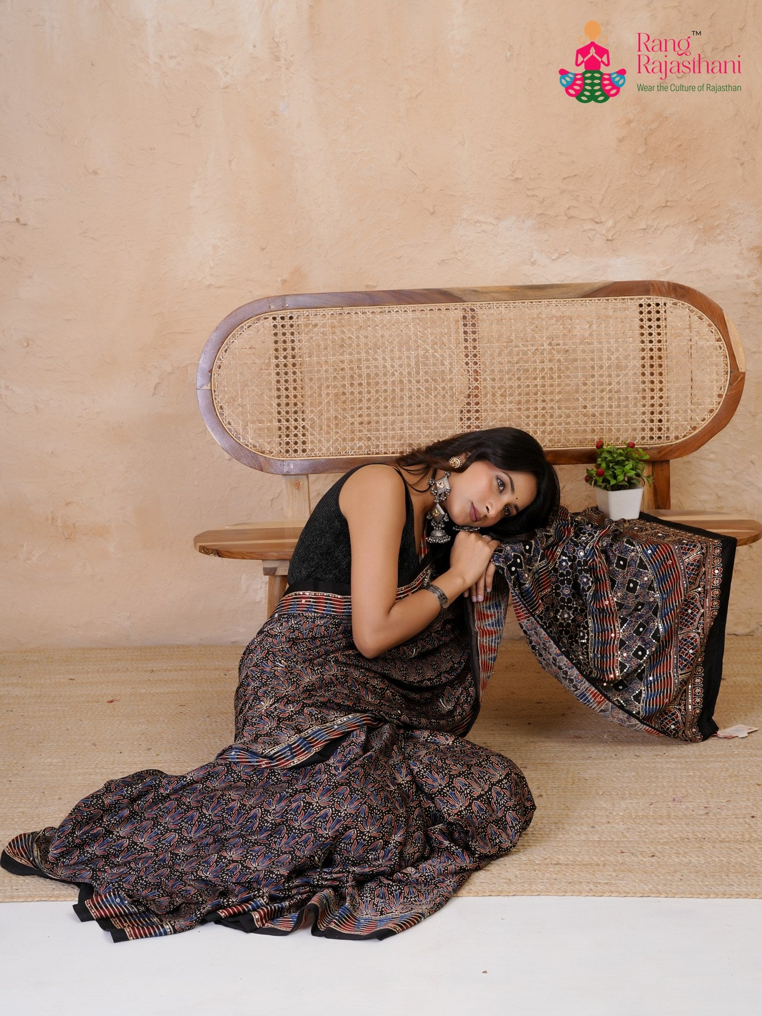 fabric texture of black modal ajrakh print saree