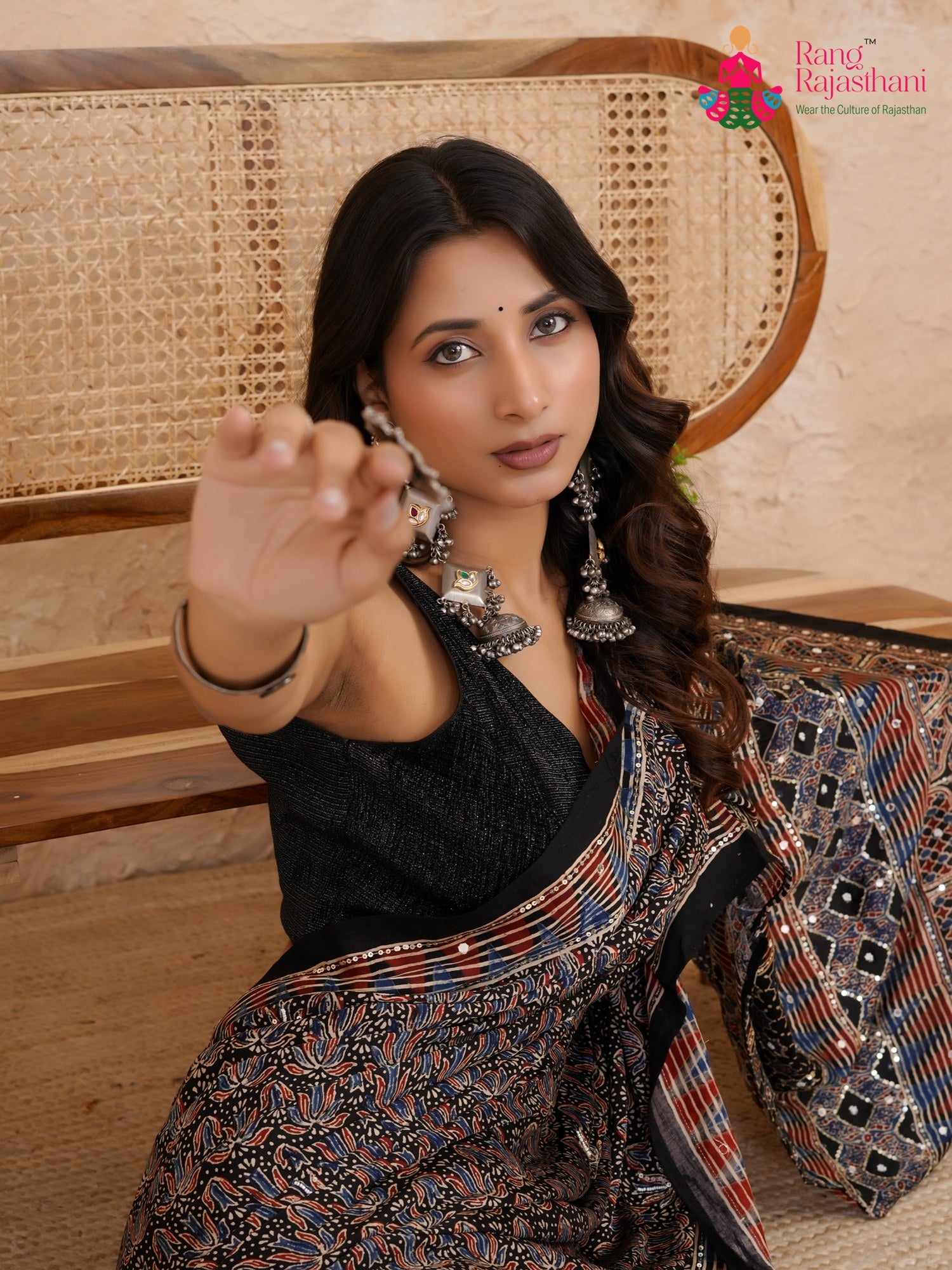 close up view of black modal ajrakh print saree