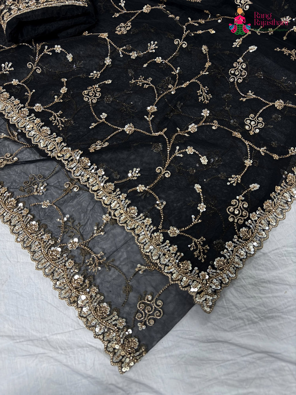 border detailing of black net hand embellishment saree