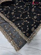 border detailing of black net hand embellishment saree