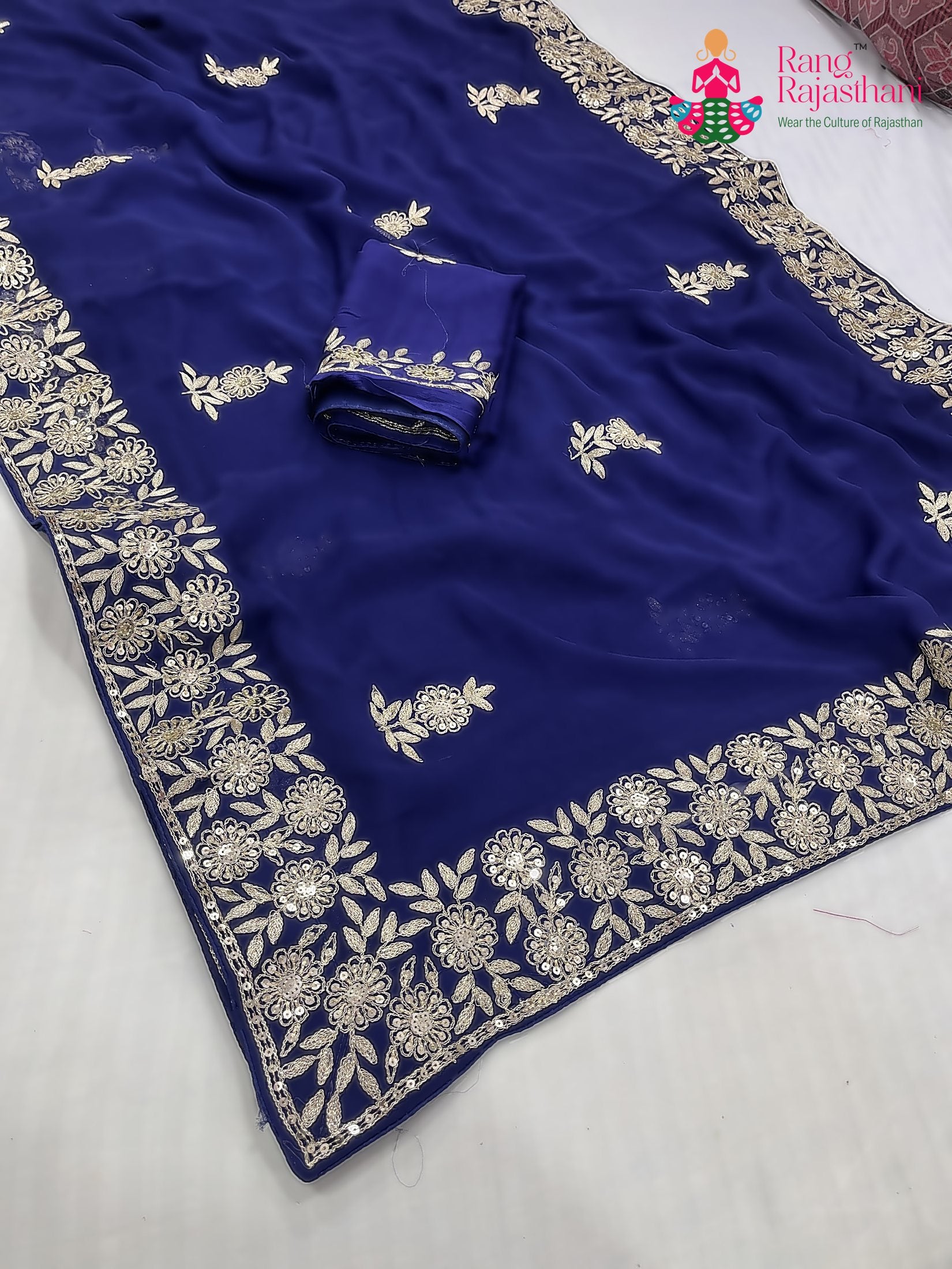 pallu detailing of blue chiffon zari embroidery saree