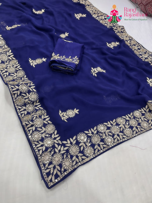 pallu detailing of blue chiffon zari embroidery saree