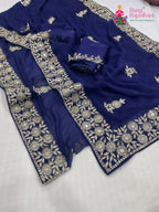 close up detailing of blue chiffon zari embroidery saree