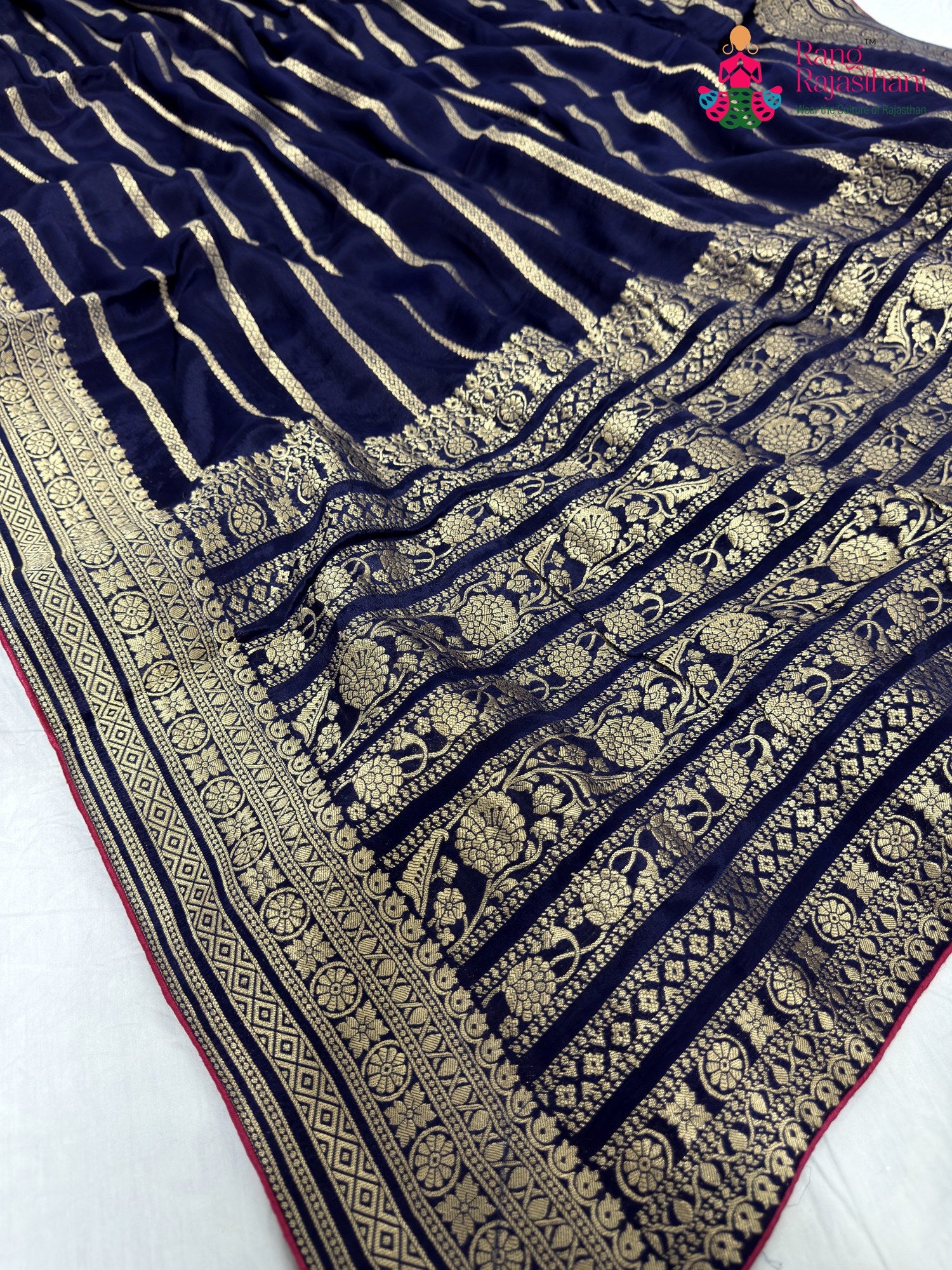 pallu detailing of blue chinnon banarasi zari weave saree