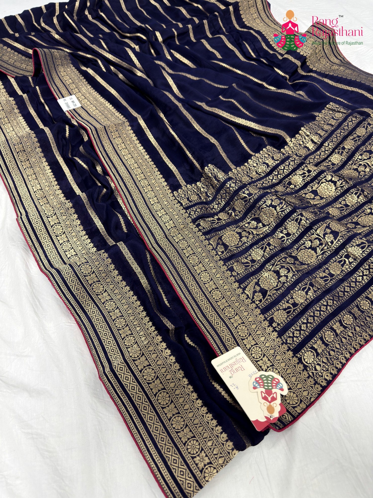 close up detailing of blue chinnon banarasi zari weave saree