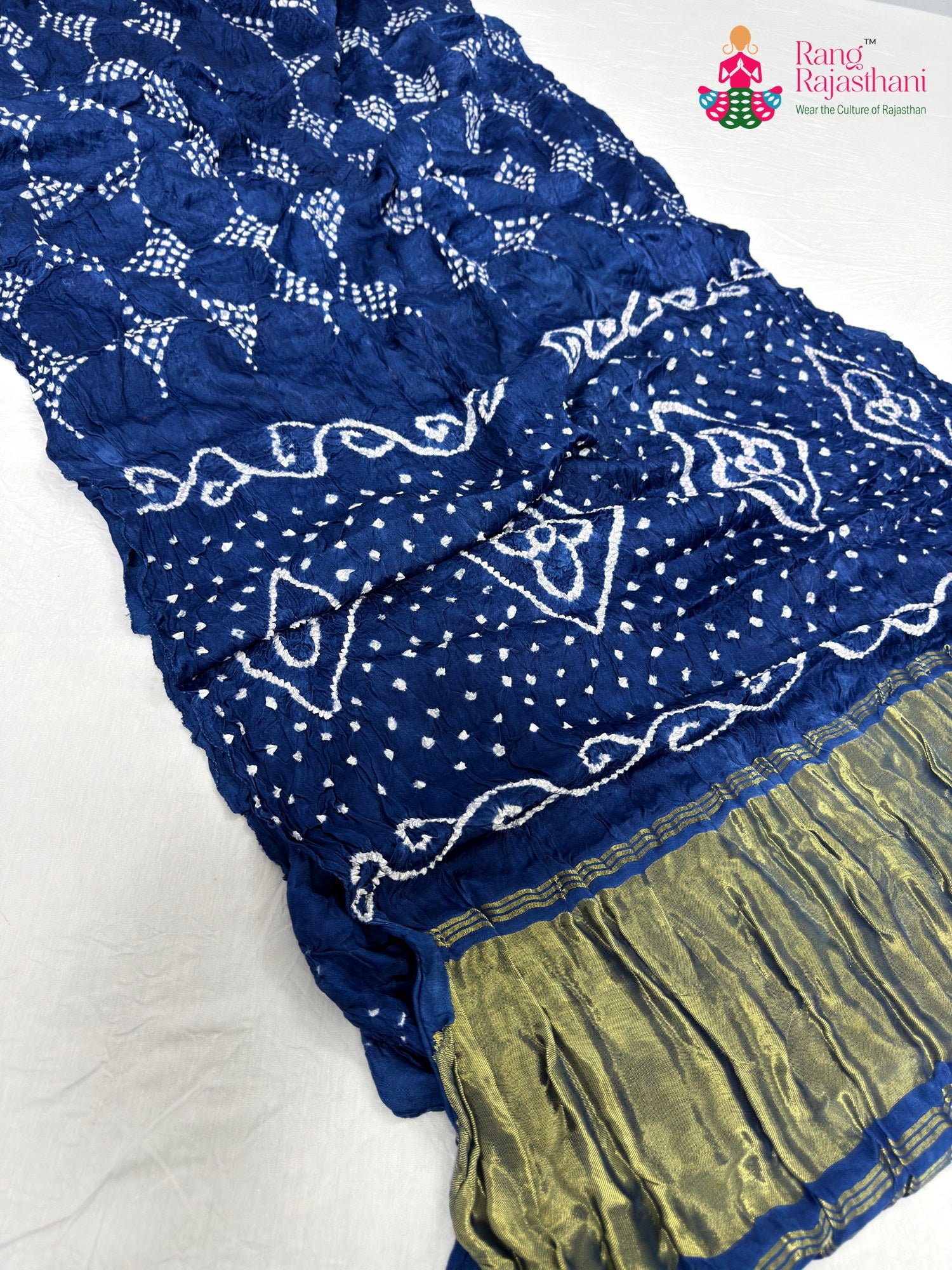 close up detailing of blue gajji silk bandhani saree