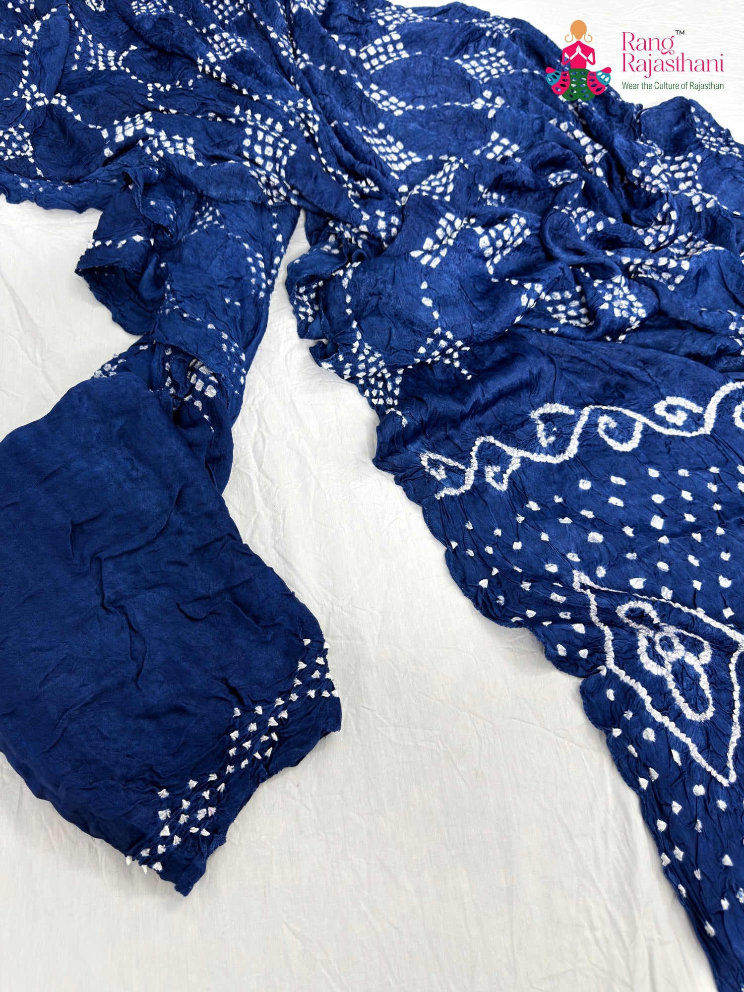 border detailing of blue gajji silk bandhani saree
