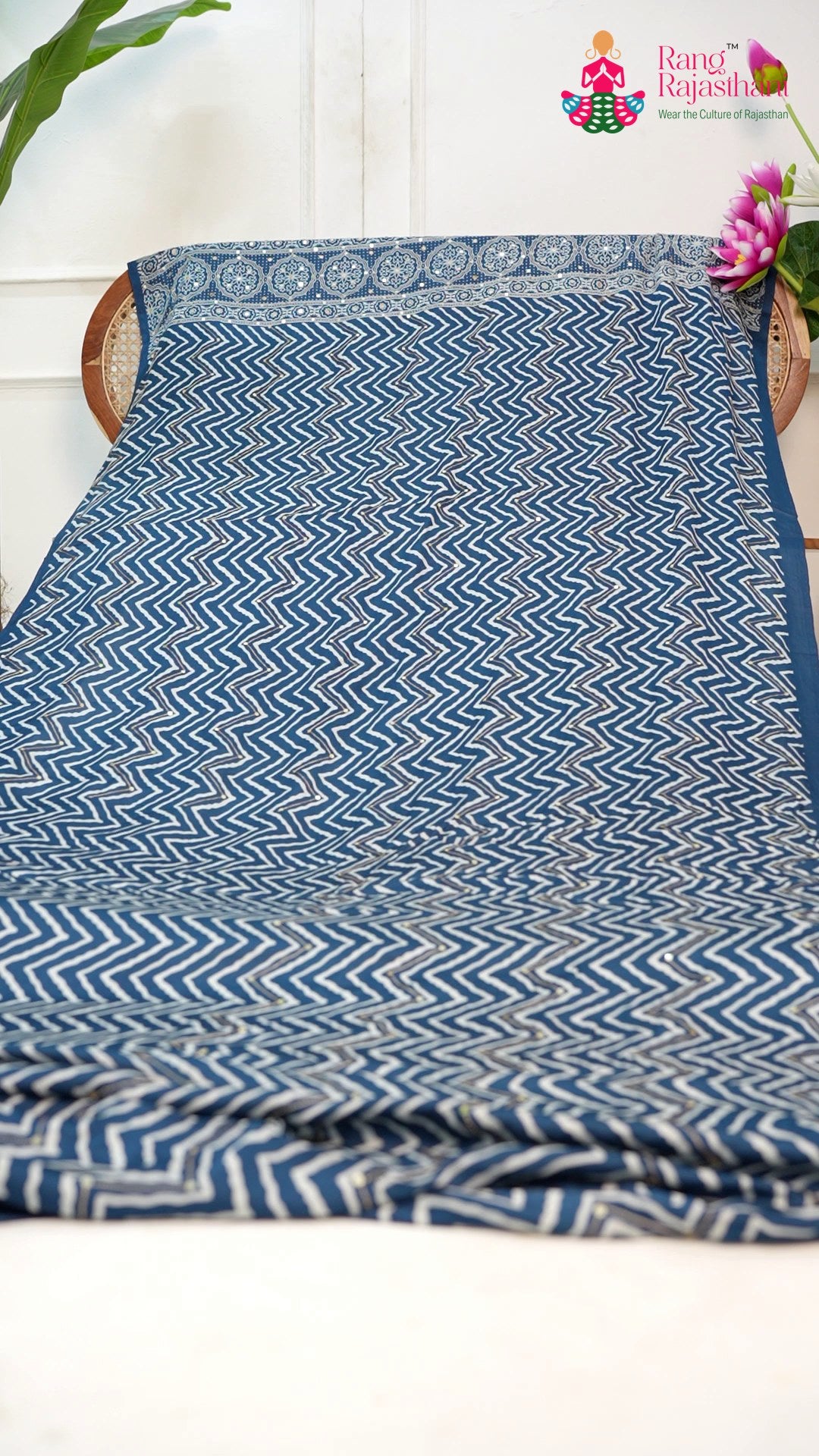 border detail of blue modal ajrakh print leheriya saree