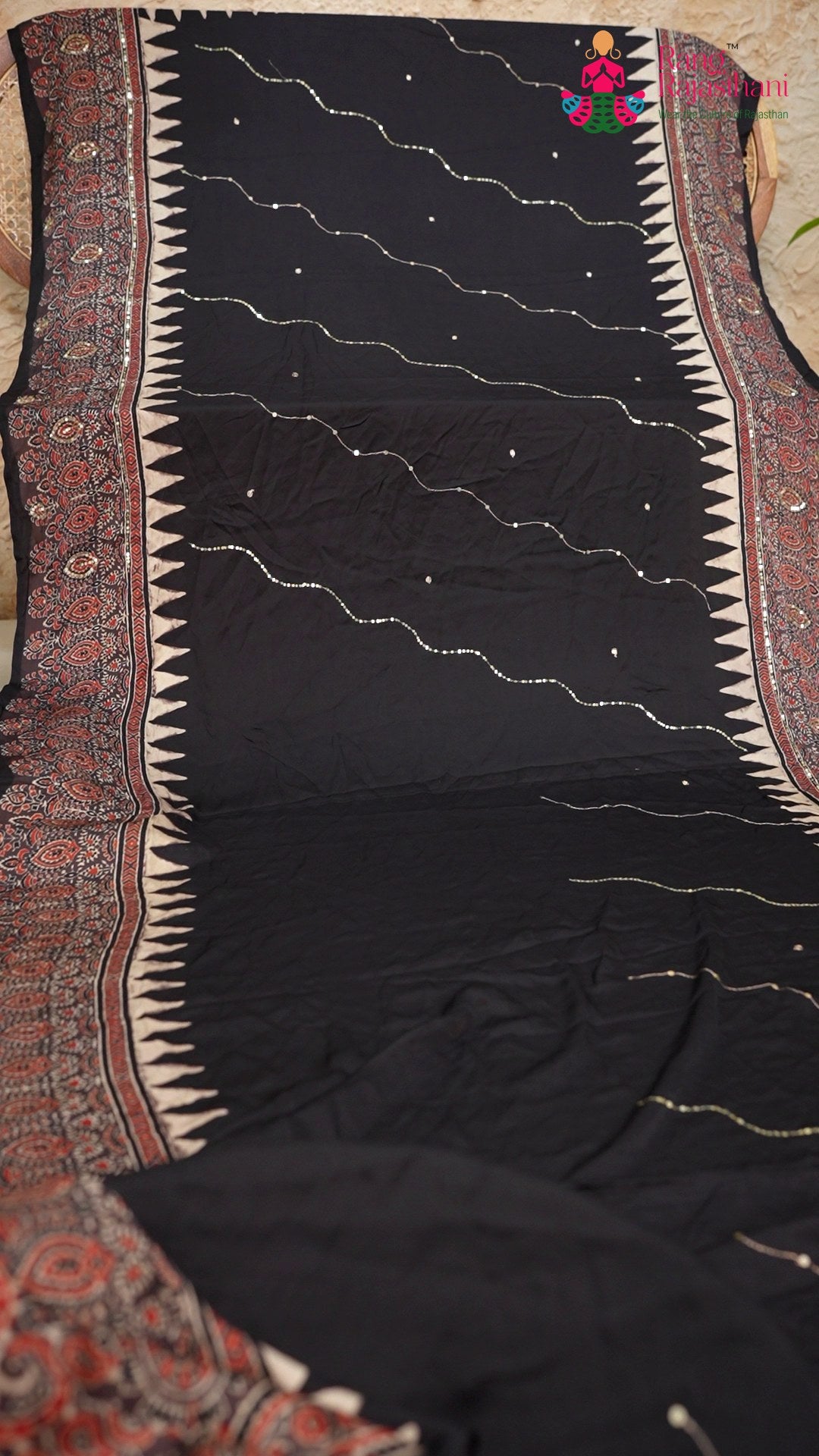 border detail of blue modal ajrakh print saree