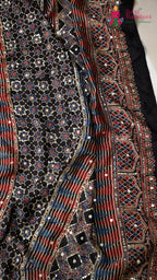 border detail of blue modal ajrakh print saree