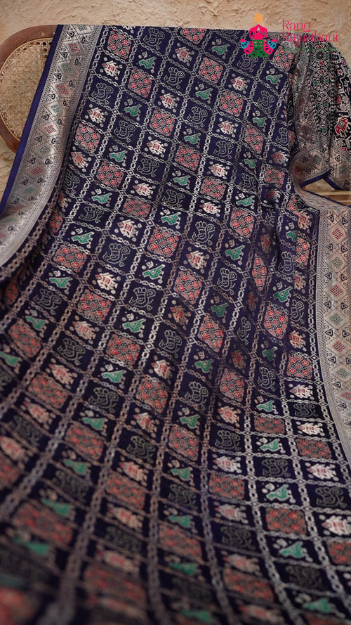 pallu detailing of blue modal banarasi zari weave gharchola saree