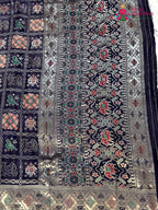 intricate detail of blue modal banarasi zari weave gharchola saree