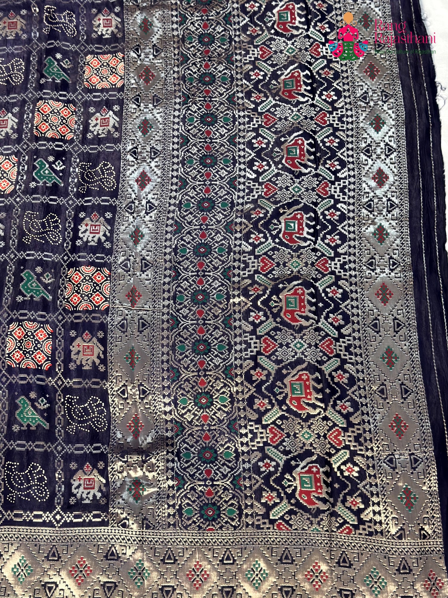 intricate detail of blue modal banarasi zari weave gharchola saree