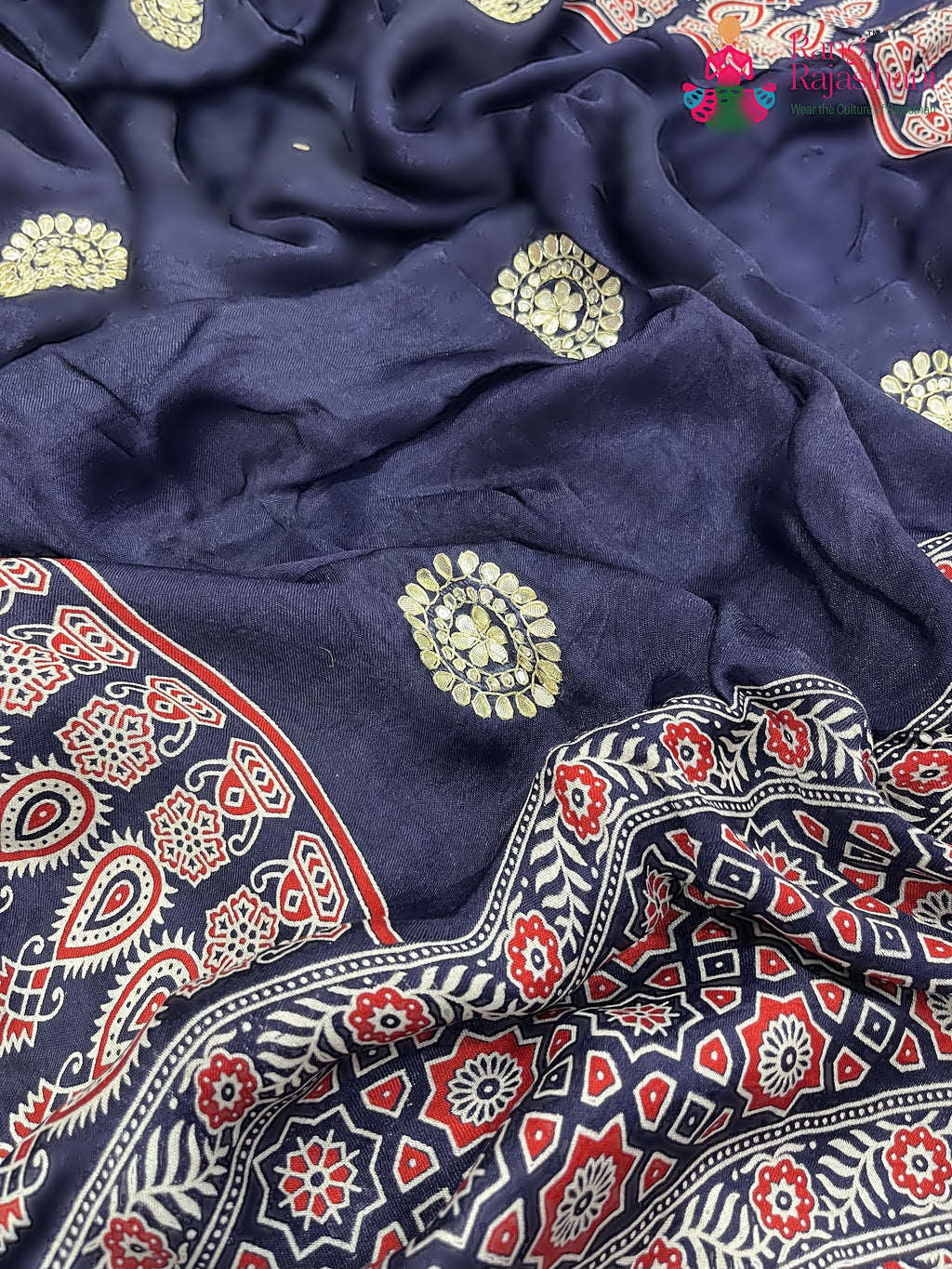 close up detailing of blue pure modal silk ajrakh print saree 