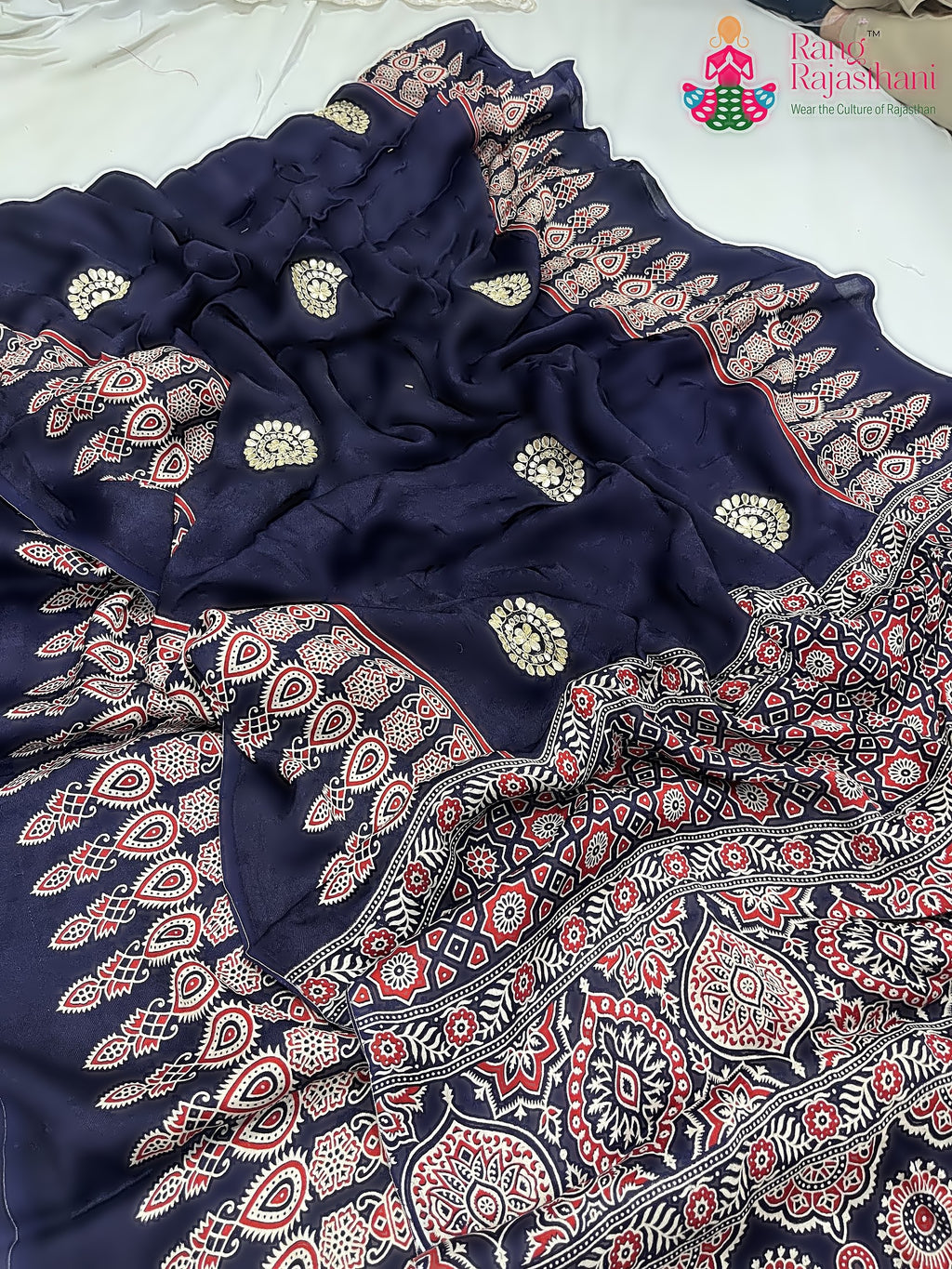 pallu detailing of blue pure modal silk ajrakh print saree 