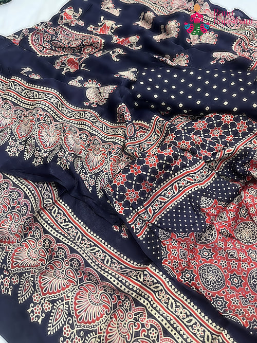close up detailing of blue pure modal silk ajrakh print saree 