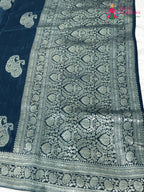 border detail of blue pure russian silk banarasi zari weave saree