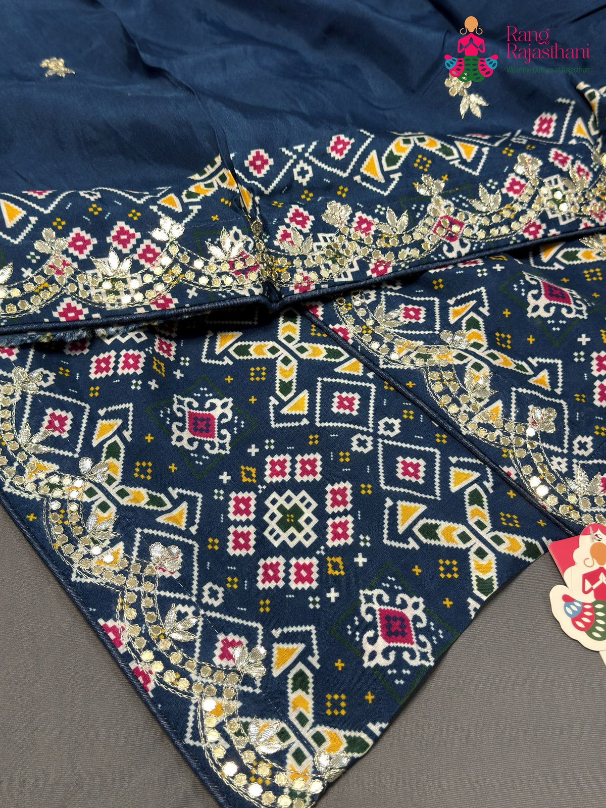 fabric texture of blue pure russian silk gota patti saree