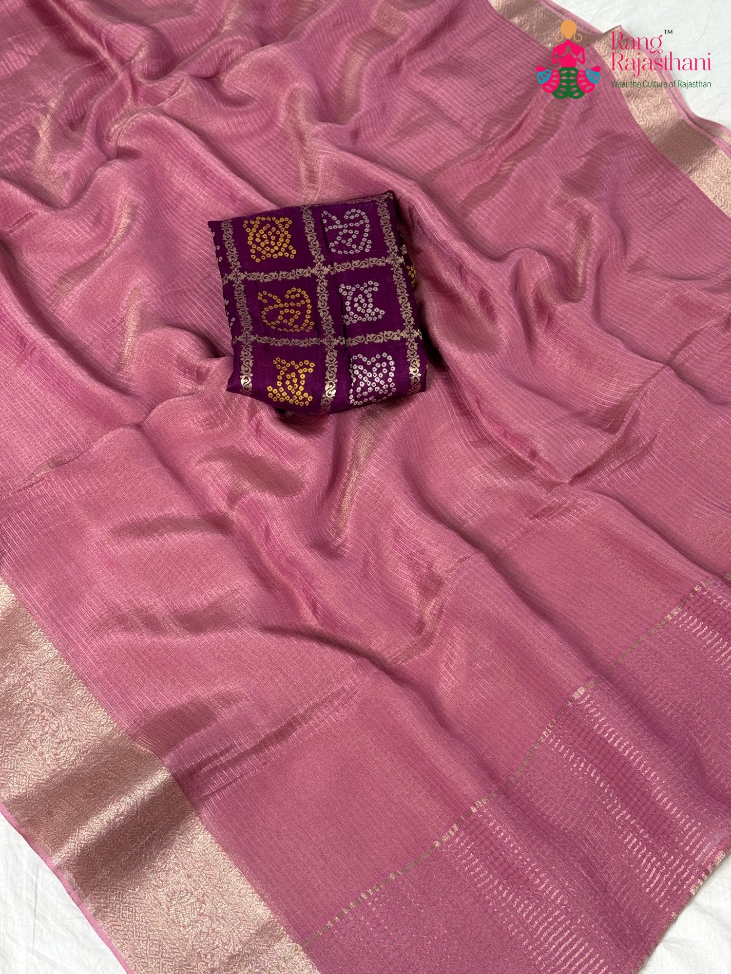 fabric texture of blush pure kota silk banarasi zari border saree
