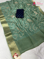 full view of breathable see green chinnon saree