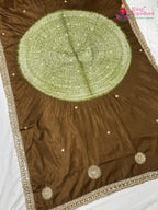 close up view of brown pure ho silk hand embellishment saree
